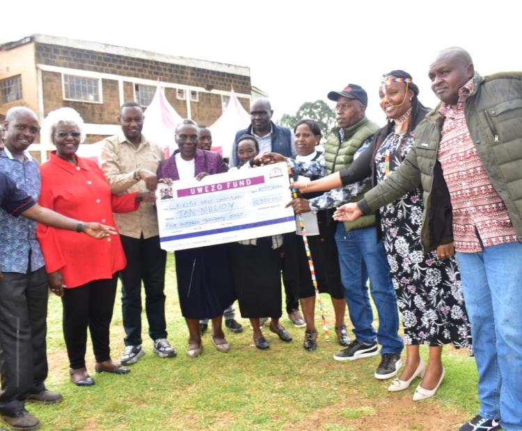 Board Director, Ms Wanjiku Muhato and Uwezo Fund CEO during the Laikipia cheque issuance